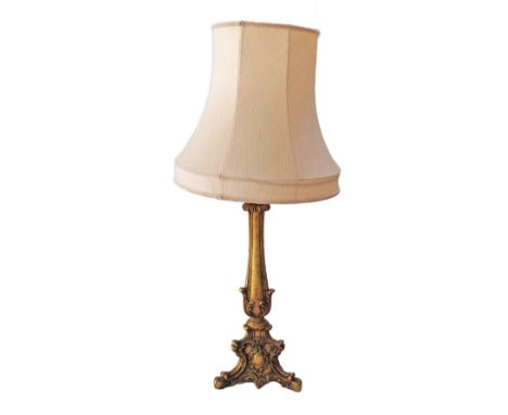 A giltwood side lamp in a pink shade. H60cm the base, H90cm with shade.
