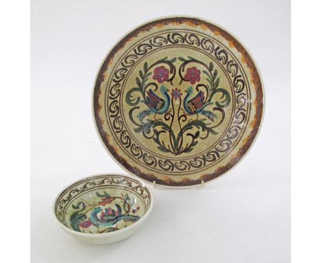 A set of two ceramic Greek Keramikos dishes, hand decorated with birds and foliage, the charger W29cm and the bowl W15cm, sig