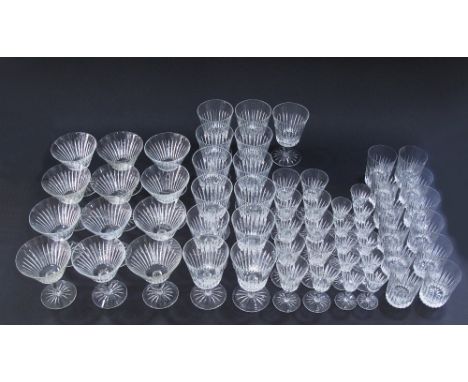 A vintage set of fluted hand made, hand cut, lead crystal glasses, some chipped rims. Five different sizes. (58)