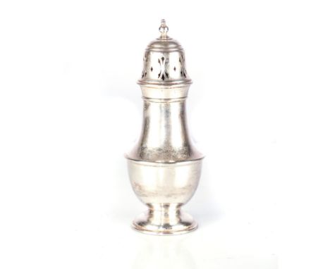 A SILVER CASTER, WALKER &amp; HALL, BIRMINGHAM, 1910 Vase-shaped with needle girdle, the pierced cover with bell-shaped finia