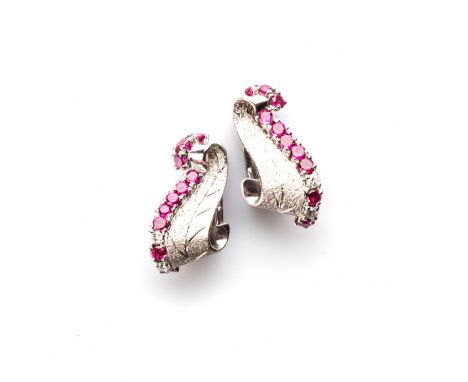 A PAIR OF DIAMOND AND RUBY EARRINGS Leaf design, embellished with 18 round claw-set rubies, weighing approximately 1,00ct, en