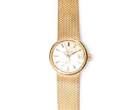 A LADYâ€™S 18CT GOLD ETERNA WATCH Manual, the round dial with gilt baton hour markers, interwoven strap with fold-over clasp,