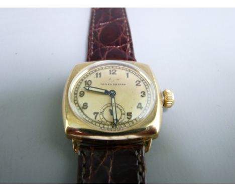 CIRCA 1930's ROLEX OYSTER 9CT GOLD CUSHION CASED WRIST WATCH, the dial set with Arabic numerals and subsidiary seconds dial, 