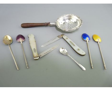 SMALL SILVER - a quantity including four colourful enamel backed silver gilt coffee spoons, a tea strainer with composition h