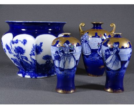 VINTAGE FLOW BLUE POTTERY including a jardiniere and three piece Dutch scene blue gilt and enamel decorated vases (damage to 