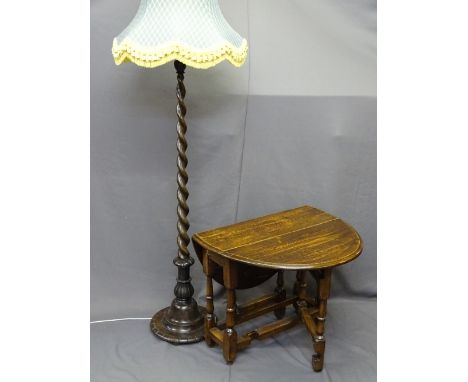 POLISHED GATE-LEG TABLE on turned supports and a twist standard lamp