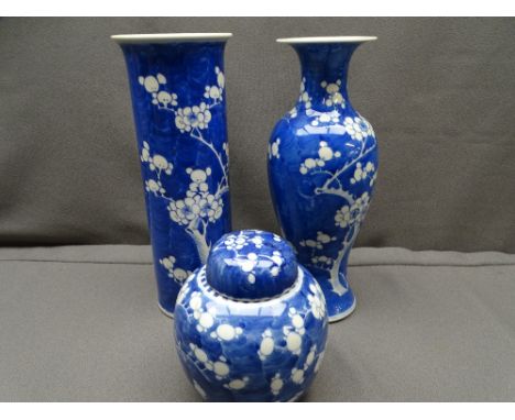 CHINESE PRUNUS DECORATED PORCELAIN, three items including a 30.5cms H cylindrical vase with flared collar, a 30.5cms H balust