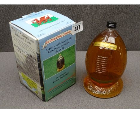 50cl BOTTLE IN SHAPE OF RUGBY BALL 1999, single Highland Scotch whisky, 'Penderyn', boxed and sealed