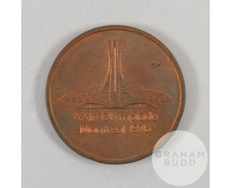 Montreal 1976 Olympic Games participant's medal, designed by G. Huel and P. Pelletier, copper, the obverse depicting Olympic 
