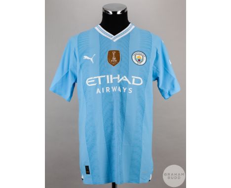 Kevin De Bruyne blue and white No.17 Manchester City short-sleeved shirt, 2023-24, Puma, size L, crew neck collar, printed cl