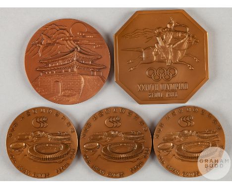 Seoul 1988 Olympic Games participation medal by K. Kwanghyun, bronze, the obverse depicting South Gate below mountain, cloud,