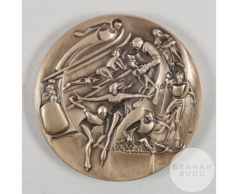 Lake Placid 1980 Winter Olympic Games participation medal by M. Jovine, white-metal, the obverse cast in relief with nine win