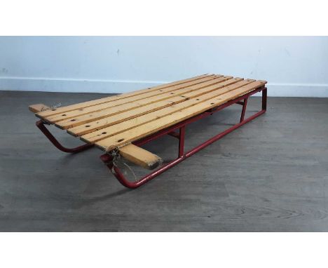 VINTAGE WOOD AND METAL SLEDGE, the metal rails painted red112cm long