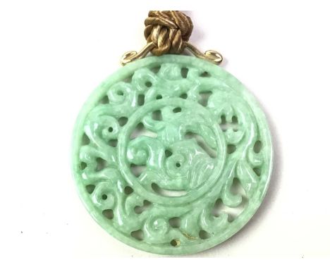 CHINESE NEPHRITE JADE PENDANT, of circular form and with pierced scrolling designs, the pendant loop and clasp marked for nin