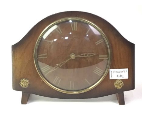 BENTIMA MAHOGANY MANTEL CLOCK, AND A BRASS FIGURAL MANTEL CLOCK  each with Roman numeralsQty: 2