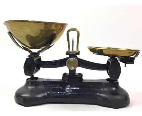 SET OF KITCHEN SCALES, with brass pans and weights, on metal stand34cm wide