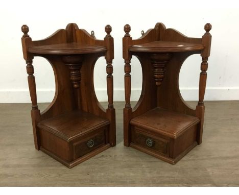 PAIR OF MAHOGANY WALL HANGING CORNER SHELVES, fitted with single shelf above a drawer54.5cm highQty: 2
