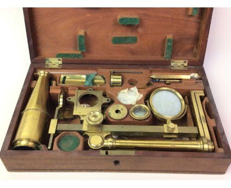 BRASS MICROSCOPE SET, LATE 19TH CENTURY unmarked, with accessories including lenses, in fitted oak caseOverall decent conditi