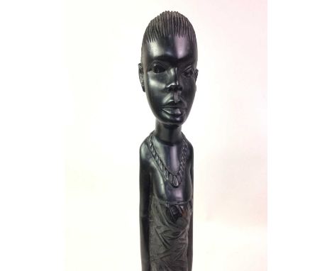 GROUP OF AFRICAN WOOD CARVINGS, a carved panel of rectangular form, a comb and four figuresQty: 6