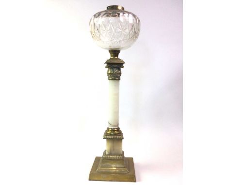 VICTORIAN OIL LAMP, LATE 19TH CENTURY the burner over a cut glass reservoir, above a turned white marble column, raised on a 