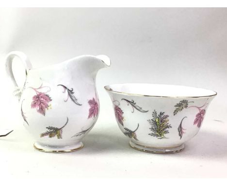 TUSCAN PART TEA SERVICE, WINDSWEPT PATTERN decorated with pink and yellow foliage on a white ground