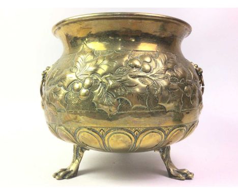ARTS & CRAFTS STYLE BRASS PLANTER, ALONG WITH SILVER PLATED WARE  the planter decorated with holly in relief, with lion mask 