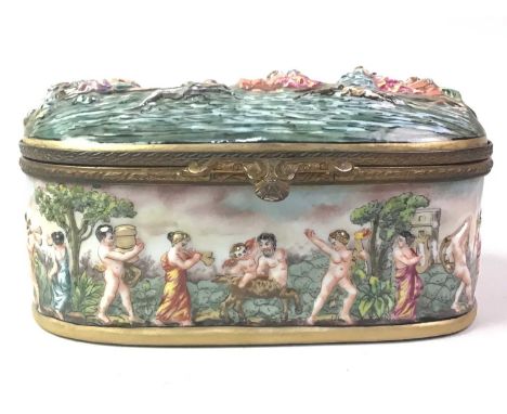 CAPO DI MONTE PORCELAIN TRINKET BOX, EARLY/MID 20TH CENTURY decorated in relief with various figures, with gilt metal mounts,