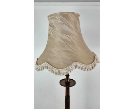 MAHOGANY FLOOR LAMP, on a circular base, with cream shade 