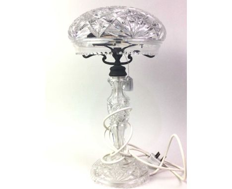 CRYSTAL MUSHROOM TABLE LAMP, MID 20TH CENTURY of large proportions, the domed circular shade on three cast iron arm supports 