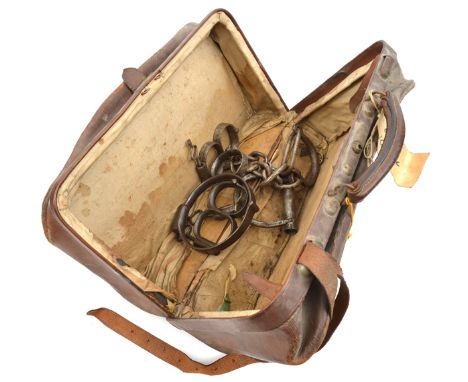 An old pair of figure of eight plug lock handcuffs,  stamped “Thompson” and “Ward”, GC; two similar pairs, of rather more cru