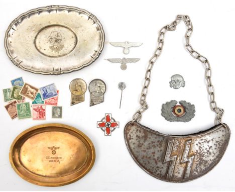 A small oval brass tray,  stamped with an eagle and swastika and “Offizierheim/ Berlin 12”; a plated oval tray with gadrooned