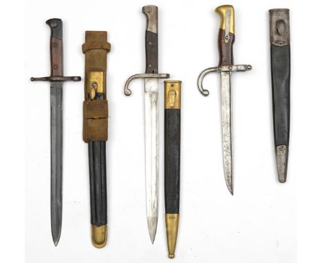 An Italian Vetterli bayonet,in scabbard; a Thailand bayonet, in brass mounted scabbard; another bayonet (AF) and a scabbard. 