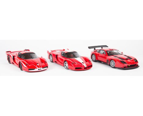 2 Hotwheels and a Kyosho 1:18 Ferrari. 2x Hotwheels 2005 FXX track day specials, 2 versions in red with white stripes/flashes