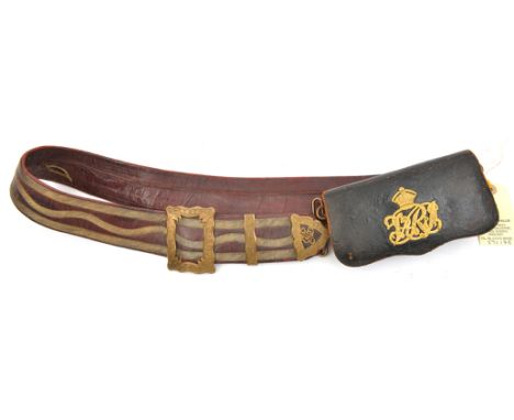 An RE officer’s Russia leather shoulder belt, triple gilt embroidered lines, engraved buckle, tip and slide incorporating “RE