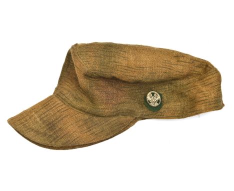 A Third Reich M43 D.A.K. floppy peaked cap, with plastic badge on oval green patch on the left side. Basically GC (needs clea