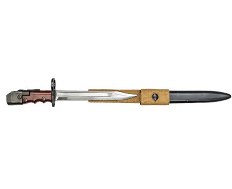 A No 7 Mk 1 bayonet/trench dagger, with swivel pommel which enables it to be a dual purpose weapon, in scabbard with frog (se