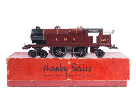 A Hornby clockwork O gauge No.2 Special Tank Locomotive. A LMS 4-4-2 loco, 6954, in lined maroon livery. Together with key, s