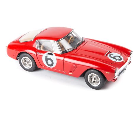 A Limited Edition CMC 1:18 1961 Ferrari 250GT. In red RN6 with white racing nose. A fully detailed model with light brown lea