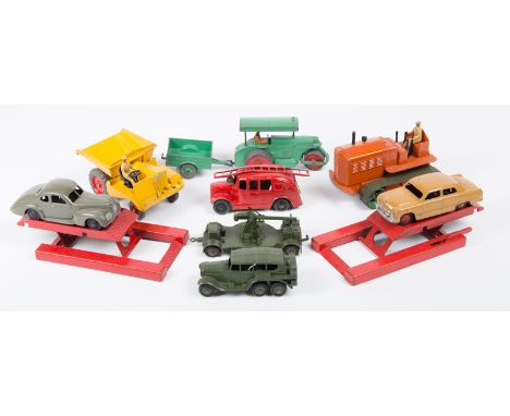 9 Dinky Toys. A Studebaker State Commander (39f) with dark grey body and black ridged wheels. A Ford Fordor Sedan (170) with 