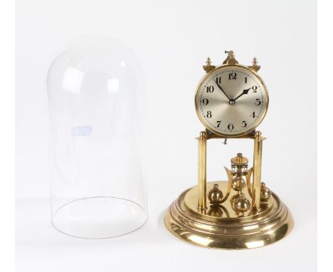German anniversary clock, the silvered dial with Arabic numerals above four rotating orb weights, housed under a glass dome, 