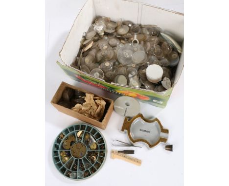 Quantity of wrist and pocket watch glasses, various sizes, circular tray containing watch parts, Incabloc ashtray (qty)