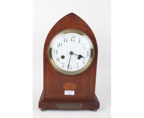 Edwardian mahogany and inlaid mantel clock, of lancet form, the enamel dial with arabic numerals, with presentation inscripti