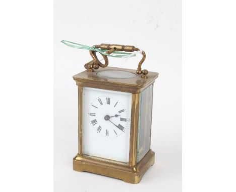 French brass cased carriage clock, the enamel dial with Roman numerals, 14cm high