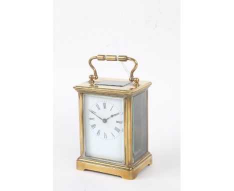 20th Century brass cased carriage clock, the enamel dial with black roman numerals, platform escapement, 10.5cm high