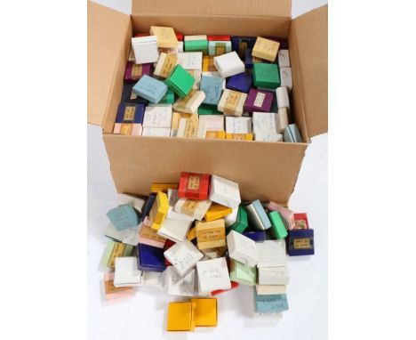 Collection of watch balance staffs and other parts housed in small boxes, to include boxes labelled Rolex, Zenith, Oris, Rota