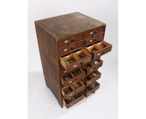 Small wooden chest of 20 drawers containing wrist and pocket watch glasses, various sizes (qty)