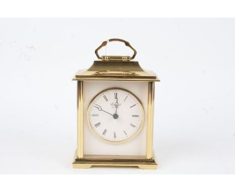 Brass carriage clock by Rapport, the white dial with Roman numerals, 14.5cm high