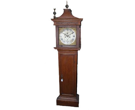 18th Century oak longcase clock by Sam Coxall of Royston, the arched hood with flying eagle finials above a glazed door, the 