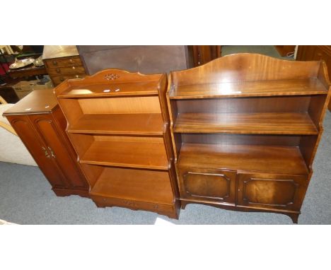 A Reproduction waterfall 3 height bookcase with cupboard base 110 x 83cm together with similar mahogany bookcase and two CD/v