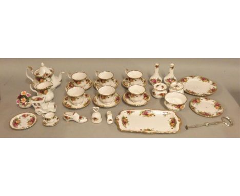 A Royal Albert Old Country Roses part tea service, consisting of six cups/saucers, teapot, sugar bowl, milk jug, cake stand, 